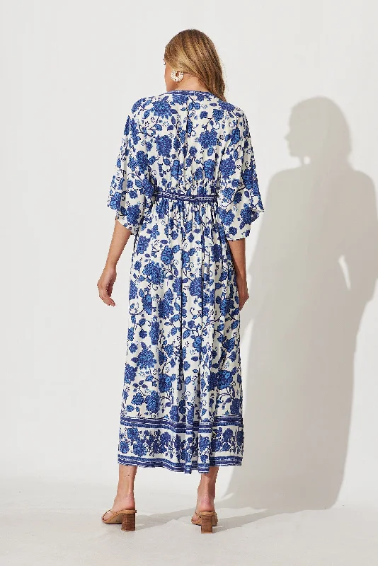break-free-maxi-in-cream-with-blue-floral-border-print