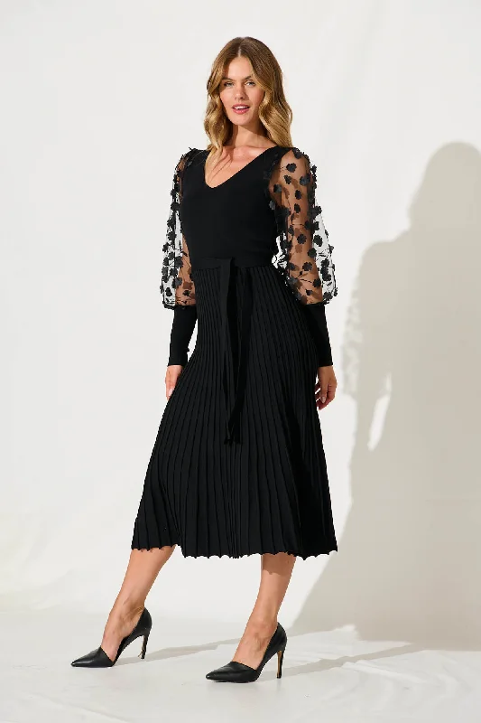 enchanted-midi-knit-dress-in-black-with-mesh-flower-detail
